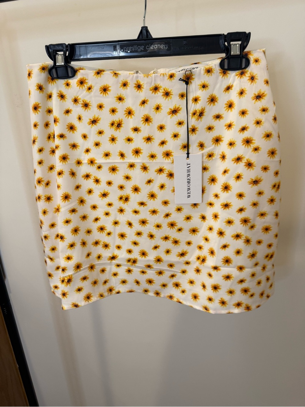 We wore What White Mini Skirt with Yellow Daisy starburst Print